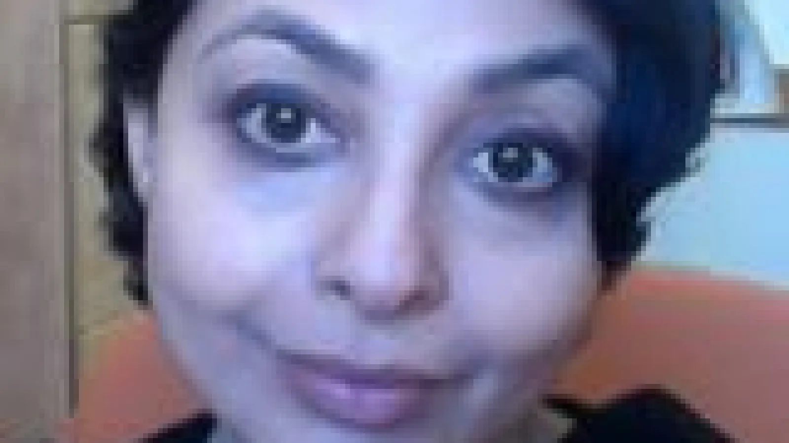 Farah Godrej, a woman with dark hair, looks directly at the camera