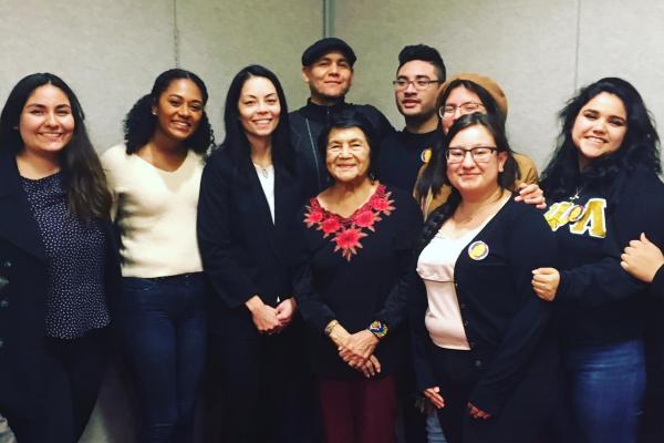 Photo of scholars, activists, and students with Dolores Huerta