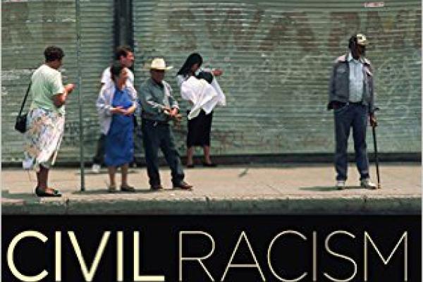 People in front of a building with the words "Civil Racism: The 1992 Los Angeles Rebellion and the Crisis of Racial Burnout"