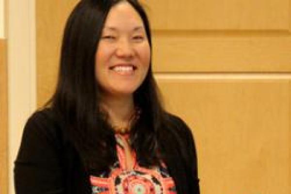 Lynn Itagaki accepting an award