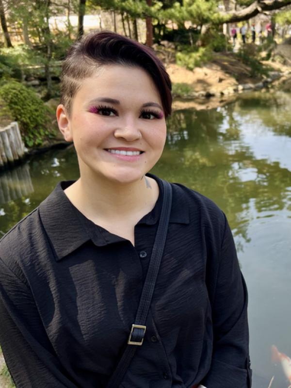 A photograph of Corinne Sugino.